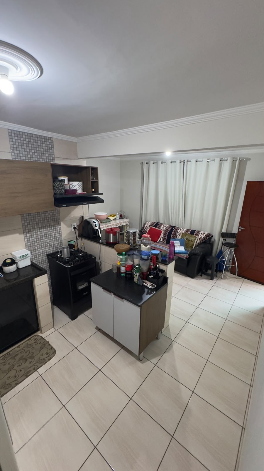 Sala integrada à cozinha