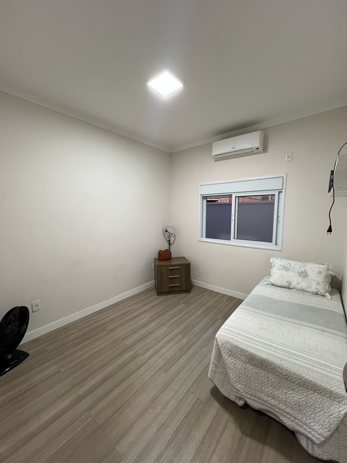 Quarto com ar-condicionado
