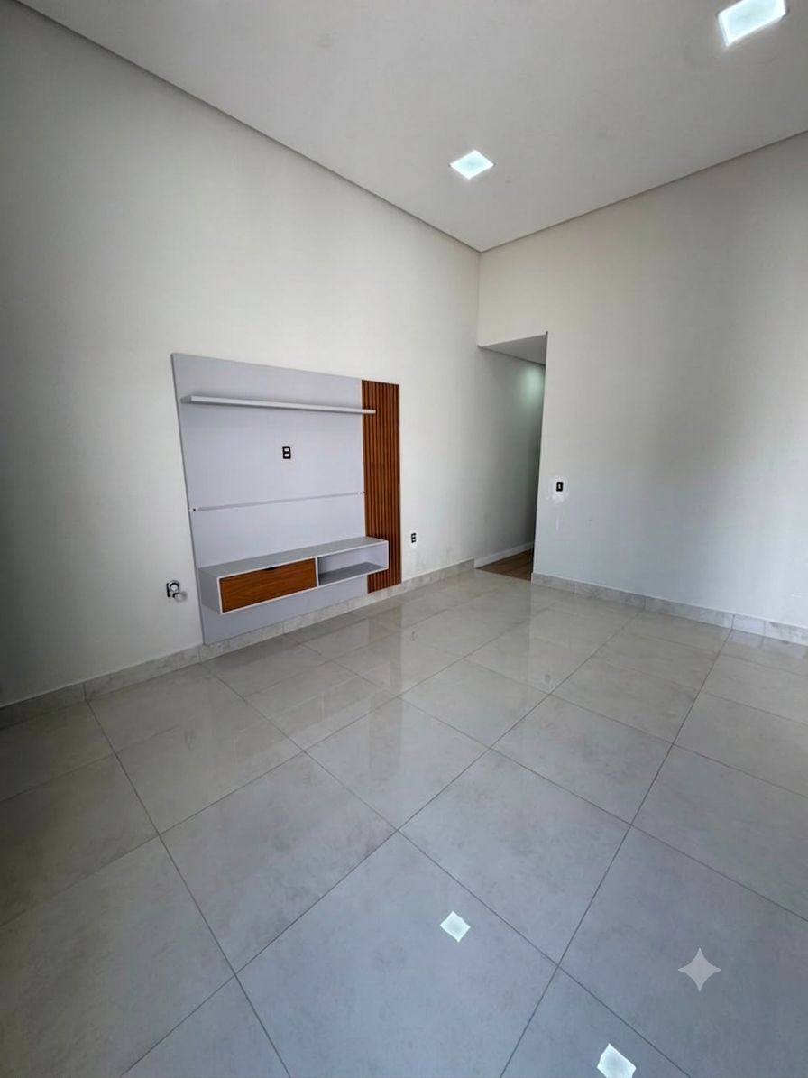 Sala com painel de TV planejado