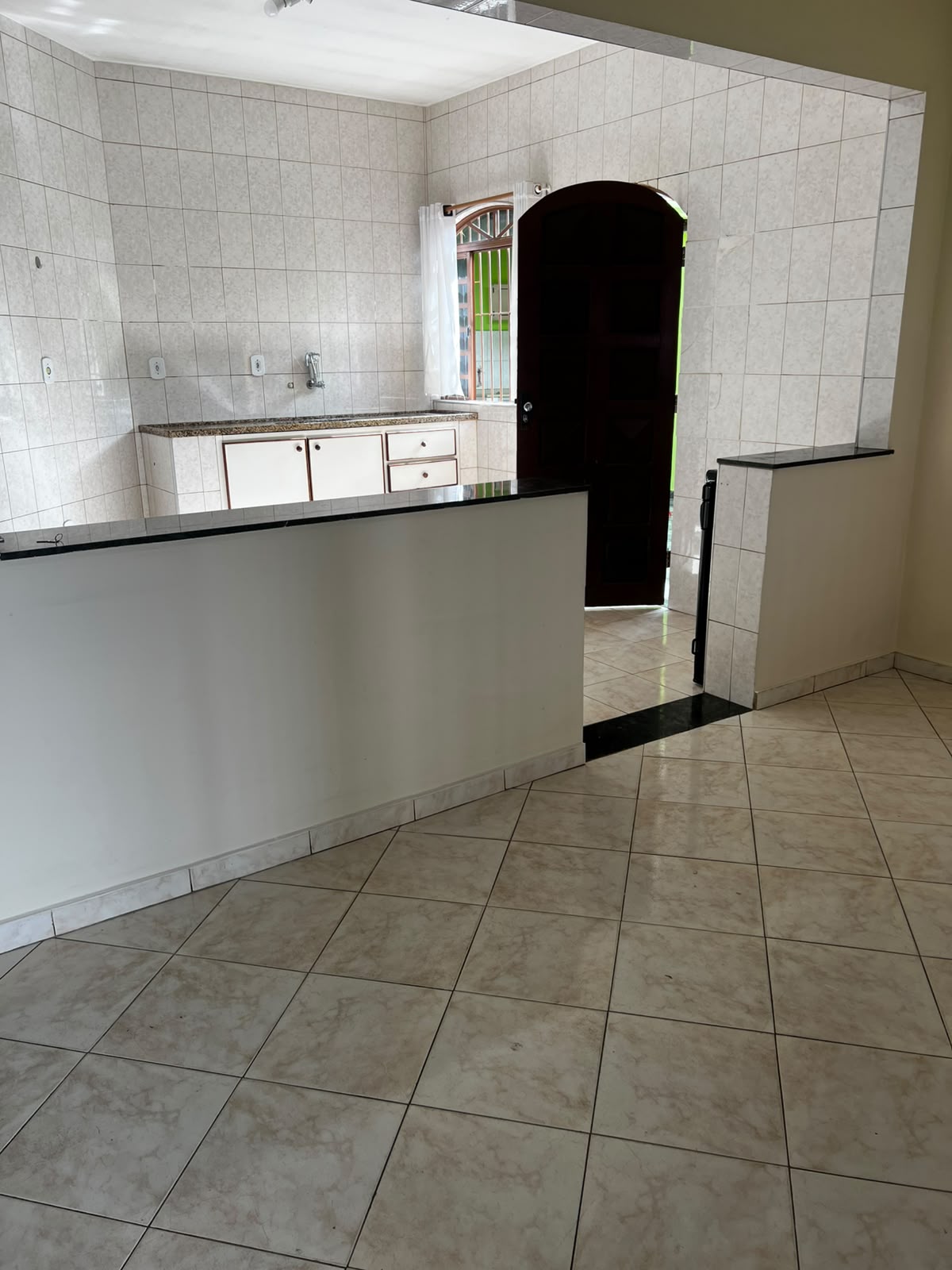 Cozinha com saída para a varanda