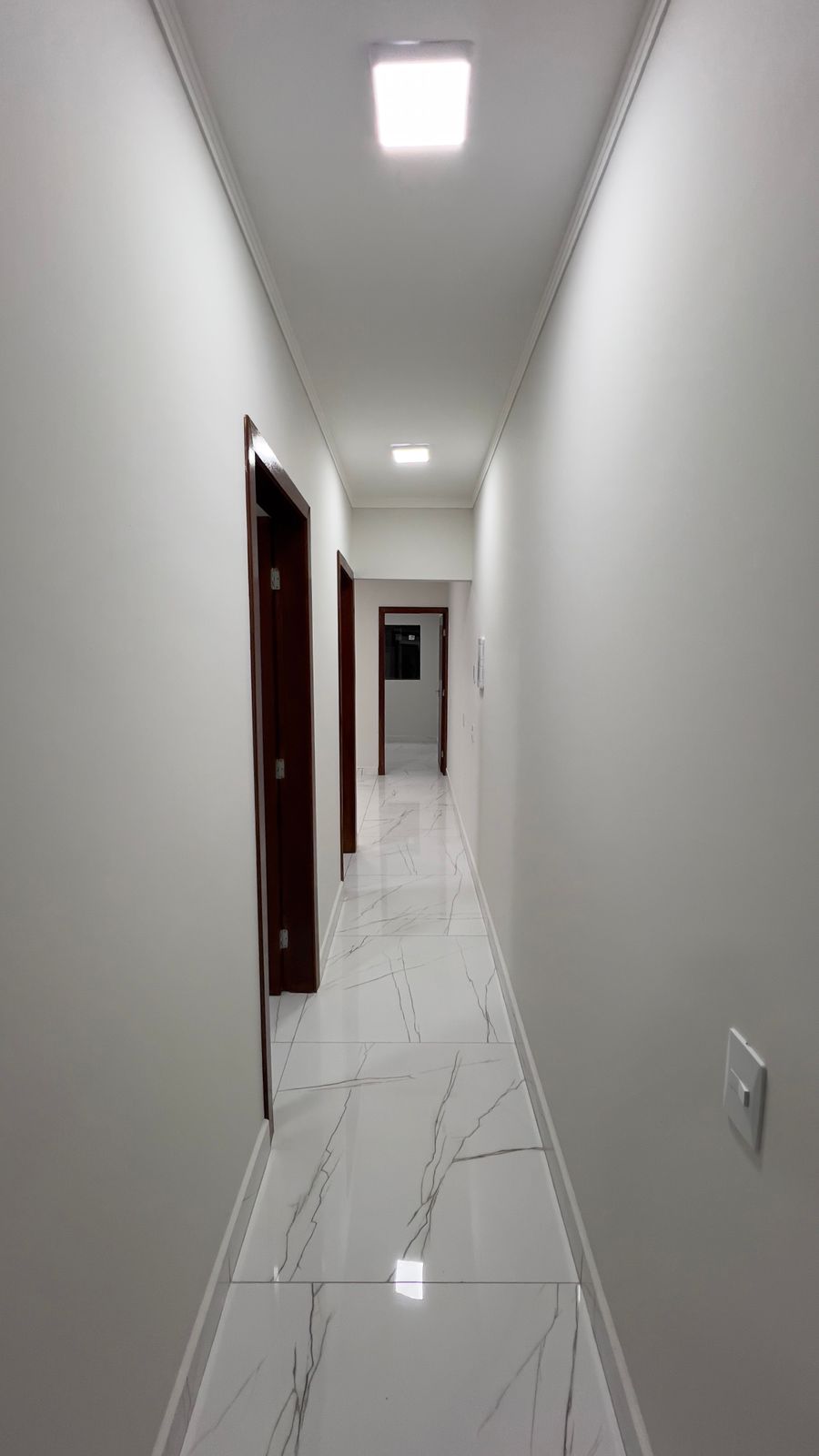 Corredor de acesso aos quartos