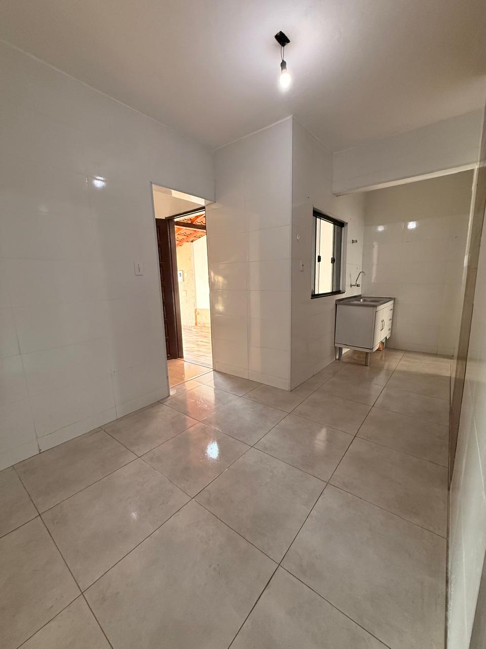 Cozinha com saída para a área externa