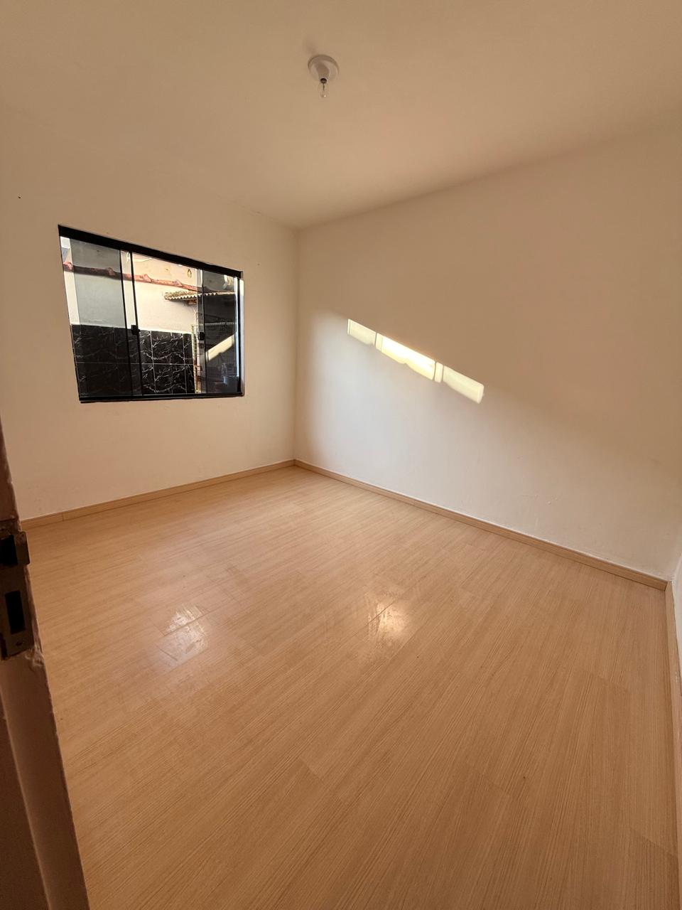Quarto com piso laminado